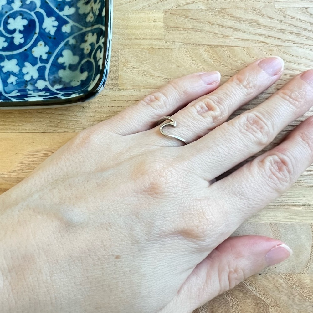 Minimalist silver thin wave band ring